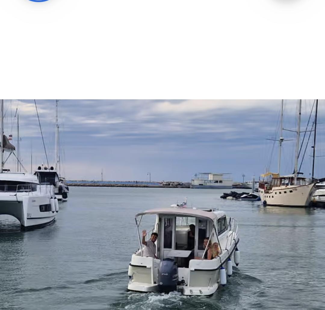 Boat underway leaving Izola harbour